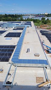 Izolace a oplechování VZT potrubí na střeše obchodního domu